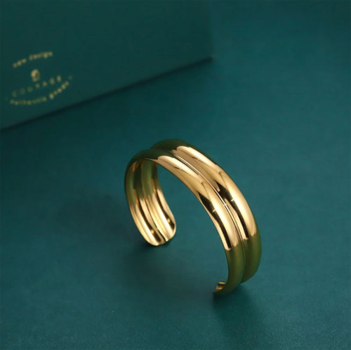 Pevný pozlacený náramek z chirurgické oceli MGSG20GD